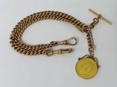 A 9ct rose gold Albert chain with George V 1913 gold sovereign, approximately 59.5g total weight.