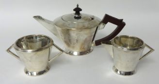 A George V silver tea set of Art Deco style circa 1933, 28 oz, makers TBA Birmingham.