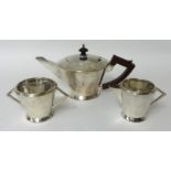 A George V silver tea set of Art Deco style circa 1933, 28 oz, makers TBA Birmingham.