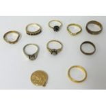 Nine 9ct gold rings including small pendant, 24g