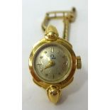 A Ladies Omega wrist watch in 18ct yellow gold, automatic movement with gold bracelet, original box,