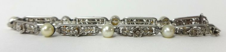 A platinum pearl and diamond bracelet circa 1900.