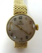 A Ladies 9ct gold Omega wrist watch in original case.