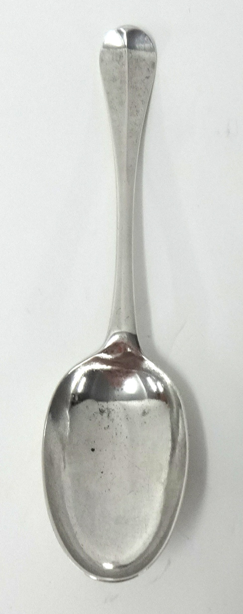 An early Georgian silver rat tail table spoon, indistinct hallmarks, the back pricked 'IL BQ 1725'
