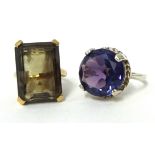 A 9ct quartz ring and a silver amethyst ring (2).
