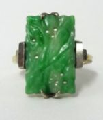A jade ring set in yellow gold, size, N.