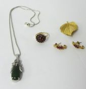 A collection of assorted jewellery including jade style drop pendants, garnet ring etc.