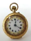 A 12ct gold fob watch with pretty enamel dial and keyless movement