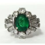 A fine emerald platinum and diamond ring , size, L set in 18ct white gold.