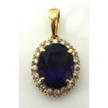 An amethyst and diamond pendant