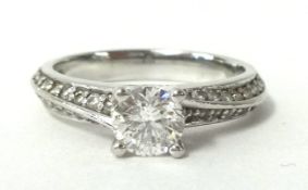 A diamond solitaire ring, approx .75 carat set in platinum, size, J, originally cost £2,450 with