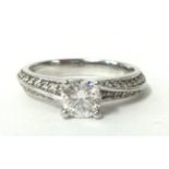 A diamond solitaire ring, approx .75 carat set in platinum, size, J, originally cost £2,450 with