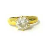 An 18ct paste stone solitaire ring, size M.