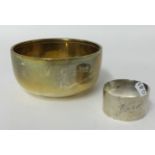 A silver sugar bowl and silver napkin ring, 4.30 oz.