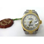 A Ladies steel and gold Rolex wrist watch Oyster Perpetual Datejust with diamond cut bezel.