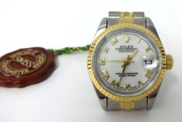 A Ladies steel and gold Rolex wrist watch Oyster Perpetual Datejust with diamond cut bezel.