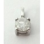 A diamond pendant approximately 0.50 ct. SI 3.