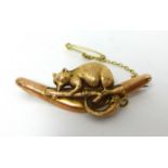 A 9ct gold Kola beer on a Boomerang brooch