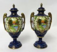 A pair of decorative Nippon trophy vases with lids (a/f)