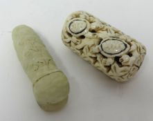 An ivory pierced carving with turtles, 5cm long also a marble caterpillar, 7cm long (2).