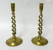 A pair of open brass and twist candlesticks, 31cm t/w a back gammon set (2).