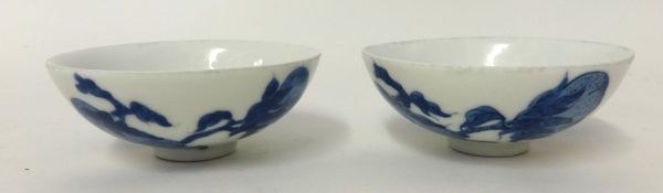 A pair Chinese blue and white tea bowl with six character marks, 84mm diameter.
