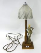 An Art Deco figure table lamp and shade