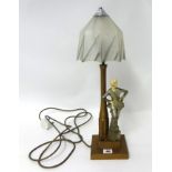 An Art Deco figure table lamp and shade