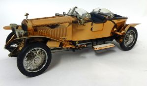 A Franklin Mint 1921 coppered bodied Rolls Royce Silver Ghost with packaging and certificates 1:24
