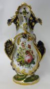 A 19th century French vase porcelain vase decorated with flowers and gilt work, 35cm