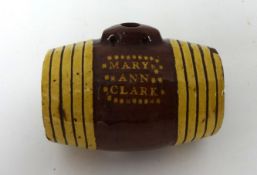 An early 19th century stoneware Costrel inscribed 'Mary Anne Clark'.