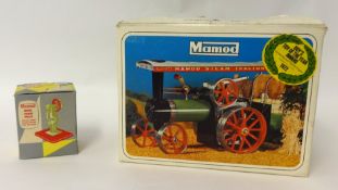 A Mamod steam tractor with power press, boxed.