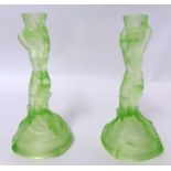 A pair of Art Deco green uranium glass mermaid candlesticks