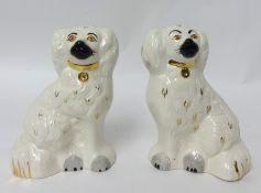 A pair of Beswick 'Staffordshire 'spaniel dogs.