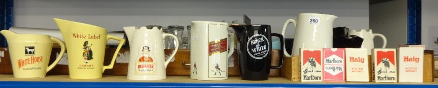 Large collection of pub advertising ware including Wade water jugs, drinking glasses, Wade,