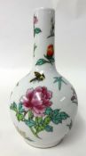 Small Chinese porcelain bottle vase, decorated with flowers and butterfly's, 17cm.