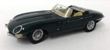 A Franklin Mint 1961 Jaguar E type coupe with original packaging 1:24