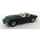 A Franklin Mint 1961 Jaguar E type coupe with original packaging 1:24