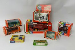 Various boxed Britain's agricultural items including Combine Harvester and Massey Ferguson Tractor