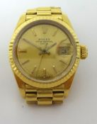 Rolex. A ladies 18ct gold Oyster Perpetual Datejust wristwatch, reference 6900, calibre 2030,