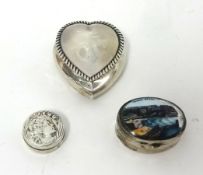 A miniature silver heart shaped box and a scenic oval pill box (3)