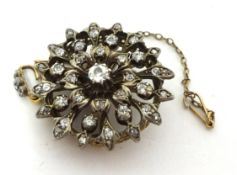 A Victorian diamond set circular Brooch/Pendant, silver set with old and rose cut stones, diamond