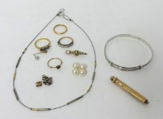 A 22ct gold wedding Ring, three other Rings, a gold propelling Pencil, a pair of Earpendants and