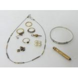 A 22ct gold wedding Ring, three other Rings, a gold propelling Pencil, a pair of Earpendants and