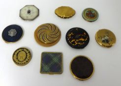 A silver and tortoiseshell pique small round compacts and various other compacts.
