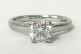 A single stone diamond and platinum ring, claw set with a brilliant cut stone, weighing 0.70cts,