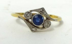 A sapphire and diamond three stone twist Ring, milligrain collet set with graduated stones, size P.