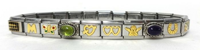 A modern silver Nomination bracelet with twenty specialist links/charms, from Drakes Jewellers,