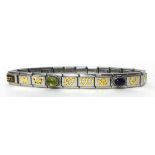 A modern silver Nomination bracelet with twenty specialist links/charms, from Drakes Jewellers,