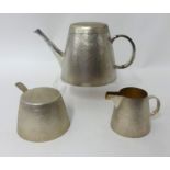 A silver bark finish three piece tea set consisting of teapot complete with matching lid, lidded